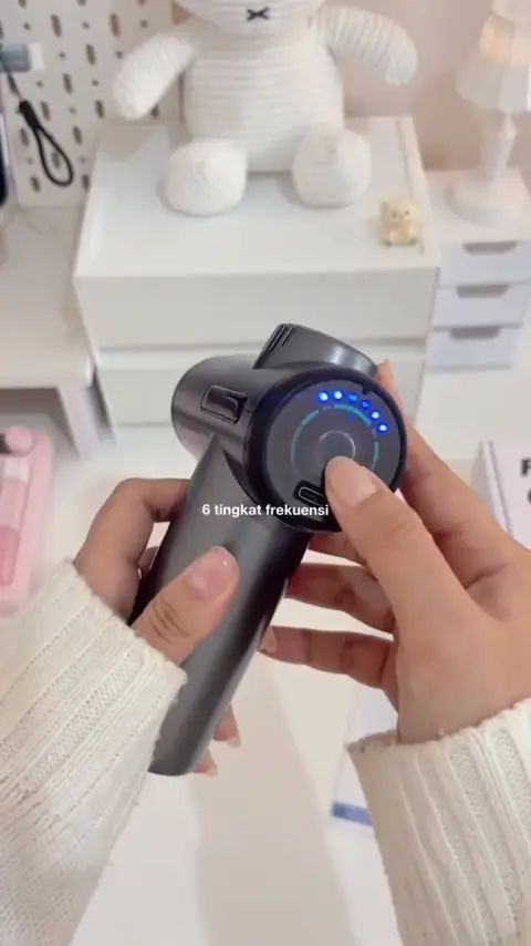 Cuplikan konten UGC massage gun portable